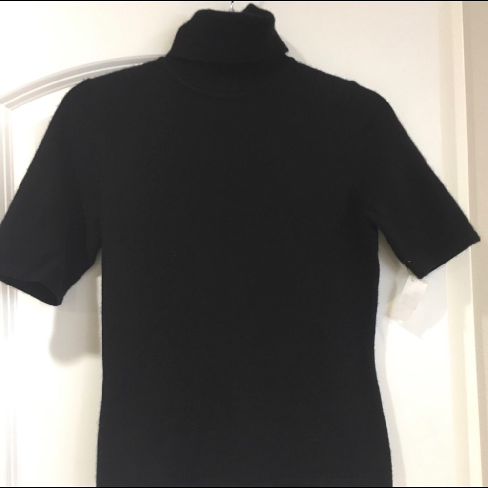 Nordstrom’s cashmere black turtle neck sweater